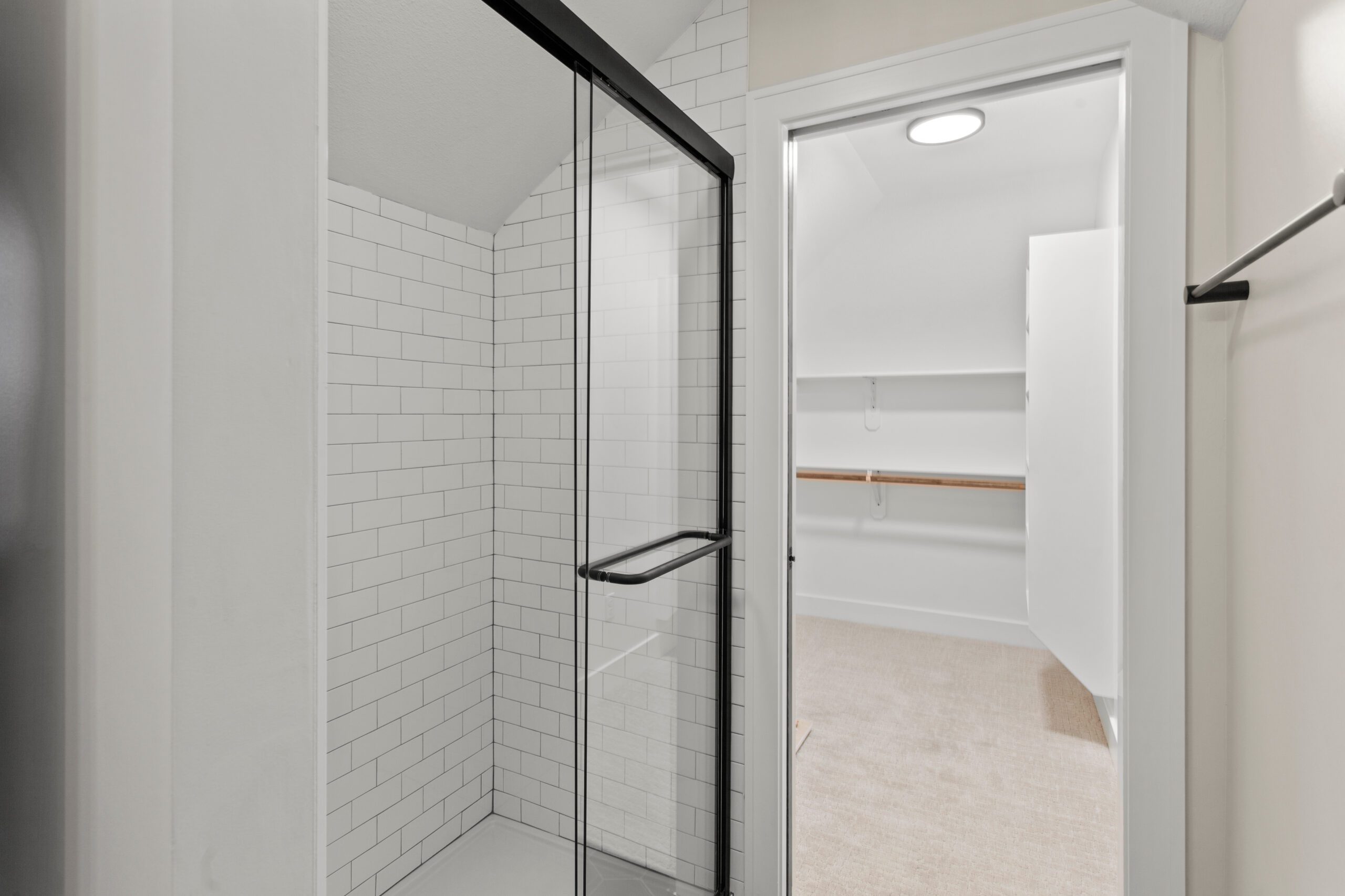 Black framed shower door sliding