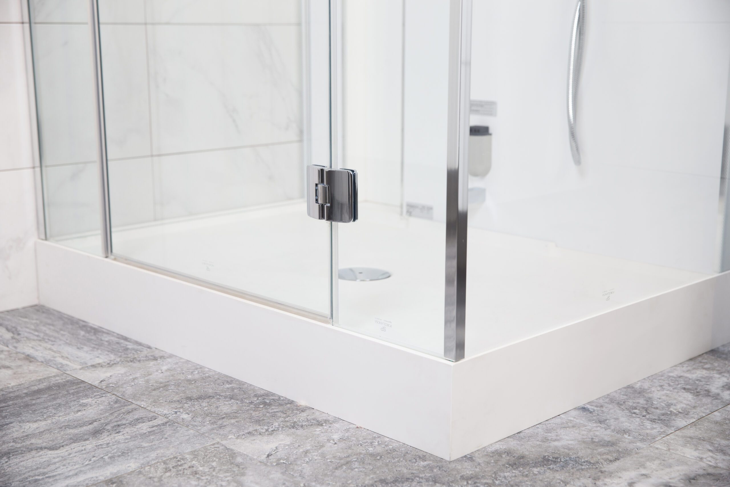 Corner of shower door bottom
